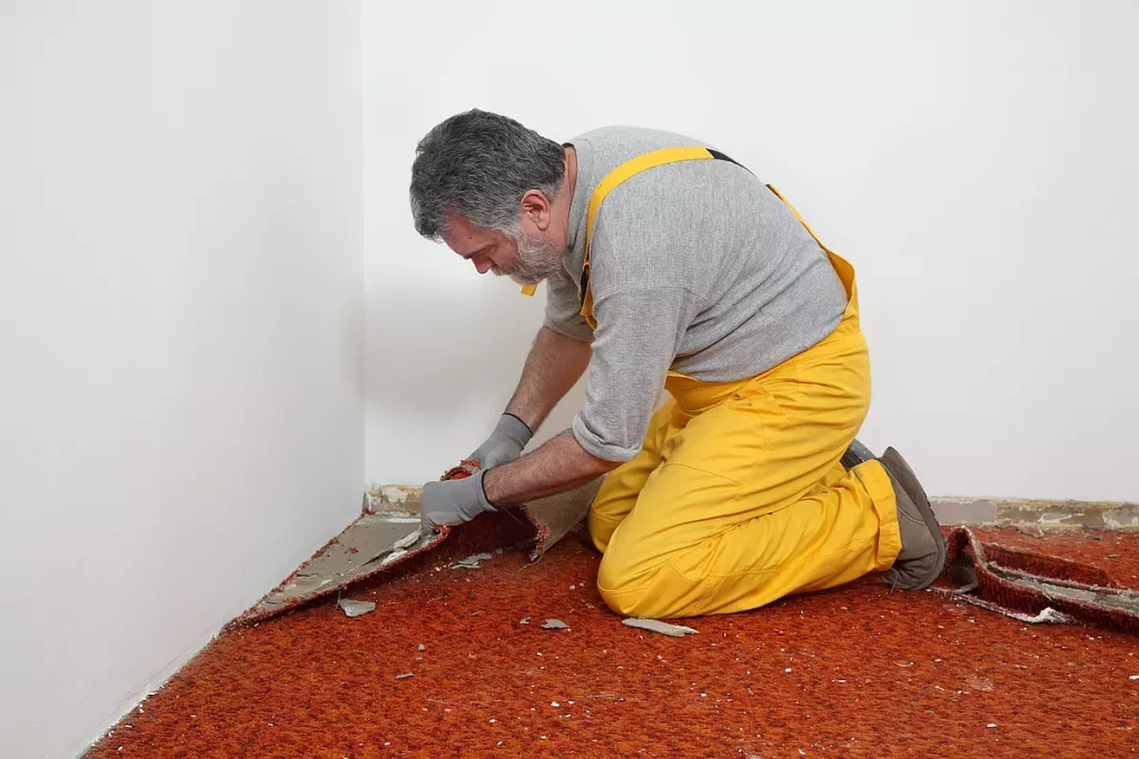 remove carpet from under walls